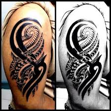 This tribal tattoo is made up of thin strips that spiral like wisps of smoke. 180 Tribal Tattoos For Men Women Ultimate Guide August 2021