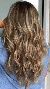 While brunettes were pushed aside for blonde locks over the years, brown hair is becoming quite trendy. Adding In Soft Blonde Highlights On A Dark Blonde Base Breaks It Up Giving Dimension And Brightness Color By Crist Hair Styles Dark Blonde Hair Balayage Hair