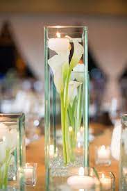 The elegance of this flower lends itself perfectly to simple but stunning tall centrepieces. Pin On Deko