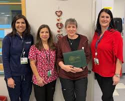 Therese Vezeridis, MA, CRS, GREEN, GRI, SRES