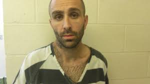 Police find suspect trapped 8 feet underground in badger hole