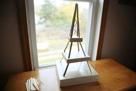 Instructions On How To Build An Eiffel Tower Made From Toothpicks Or Popsicle Sticks Eiffel Tower Craft Eiffel Tower Paris Party Decorations