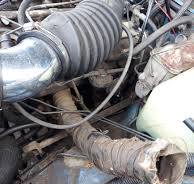 What is this hose that runs off the exhaust manifold and is ...