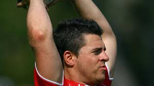 Ton-up for Reds stalwart