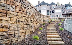 Rcp manufactures and provides a full line of keystone and bella vista retaining wall blocks to assure we can meet the needs of both residential landscape and structural. Landscaping Blocks 18 Ways To Use Them In Your Yard Lawnstarter