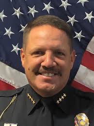 Police chief steps down as review launched