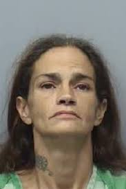 Police: Woman shoots convenience store employee, arrested minutes later