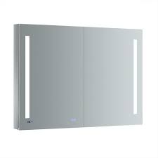 Secure it with a bead of silicone around the edges (image 2) to hold it in place and create a vapor barrier seal. Fresca Tiempo 48 In W X 36 In H Recessed Or Surface Mount Medicine Cabinet With Led Lighting And Mirror Defogger Fmc014836 The Home Depot