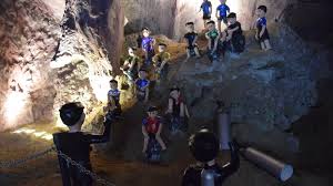 Bicycles and backpacks of the boys parkedoutside the cave. National News Bureau Of Thailand