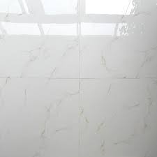 The delicate white carrara marble floor tile effect combines gray and white tones and textures to create a soft and tranquil appearance. China Popular Carrara Marble Floor Ceramic And Porcelain White Tile Texture China Floor Tile Ceramic Porcelain Tile