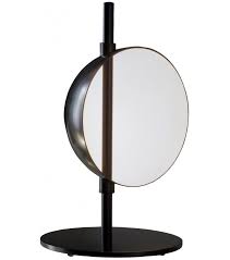 Floor lamp with indirect and reflected light and two rotating half spheres, to direct the light, in opaque white painted metal. Superluna Table Lamp Oluce Milia Shop