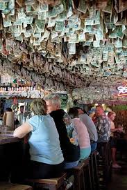 No Name Pub Dollar Bills Hang From The Ceiling It May Be Hard To Find But The Funky Atmosphere Of This Florida Keys Road Trip Road Trip Florida Visit Florida