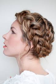 This braided updo is just four regular braids (plaits) pinned up at the back of your head. A Twist On An Old Braid Hair Romance