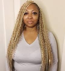 Updated 30 Eye Catching Blonde Box Braids August 2020 Blonde streaks in dark brown hair. eye catching blonde box braids