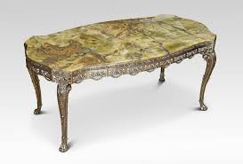 An organically formed solid piece of onyx fashioned into an unique coffee table. Brass And Onyx Coffee Table Antiques Atlas