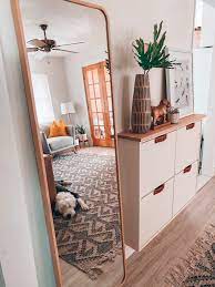 we ve seen this shoe cabinet hack all over pinterest and there is a reason why first it s a perfect small storag ikea living room ikea shoe cabinet ikea home