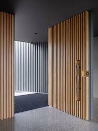 These 13 Sophisticated Modern Wood Door Designs Add A Warm Welcome Modern Wood Doors Wooden Front Doors Wood Doors Interior