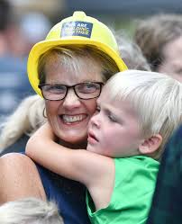 Whether by animal, tractor or plant, kids dig in at Deere Pavilion