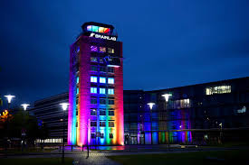 A man carries lgbt pride flags outside the allianz arena in munich before germany and hungary face. Ofdwj0ae Jto5m