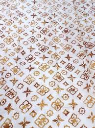 Makna warna merah dari motif betawi adalah. Batik Betawi