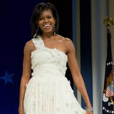 Michelle obama wears a bright red dress from designer jason wu as jennifer hudson performs. First Lady Fashion 75 Years Of Inaugural Gowns Allure