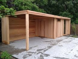 Gartenhaus Schuppen Oder Abstellraum Mit Flachdach Und Markise Loungebereich Abstellraum Flachdach Gartenhau Garten Flachdach Gartenhaus Gartenhaus