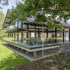 There is an existing huf haus on neighbouring land (built on a site where there was previously a 2 bedroom cottage). Huf Haus Abode2