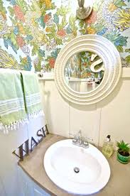 Photo about clean white bathroom sink with oral hygiene essentials, in foreground man drying his face using clean towel. How To Paint A Sink