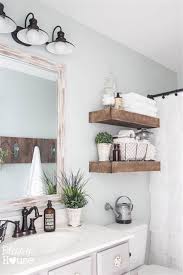 The pristine white tub, sink, and medicine cabinet really pop against the ridged ceiling, stone walls, and wood floors. 50 Best Modern Country Bathroom Design And Decor Ideas For 2019 Homenthusiastic Country Bathroom Designs Modern Country Bathrooms Farmhouse Bathroom Decor