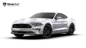 A gathering of floor and wall tiles and mosaics in honed black marble, honed snow white marble and great black and snow white mosaic patterns and combinations. Ford Mustang White Marble Design Wrapstyle
