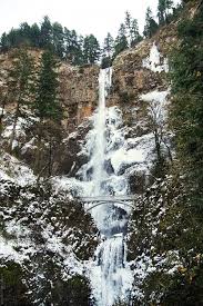Foot high multnomah falls, columbia river highway, oregon, the fourth highest in the usa, dwarf a bridge in front of them. A Frozen Multnomah Falls In The Columbia River Gorge By Kate Ames Multnomah Falls