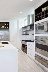 They designed a beautiful kitchen remodel for us, and the prices were very reasonable and affordable. 6 Kitchen Flooring Trends For Every Style And Budget Modern Kitchen Kitchen Ideas Tile Flooring Sleek Kitchen Cabinets Kitchen Flooring Trends Sleek Kitchen