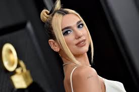 Hippy trippy tattoos are on the upraise. Dua Lipa S Angel Shoulder Tattoo Let Demi Lovato Rihanna And Lady Gaga Show You How To Seamlessly Pull Off A Sexy Tattoo Popsugar Beauty Photo 22
