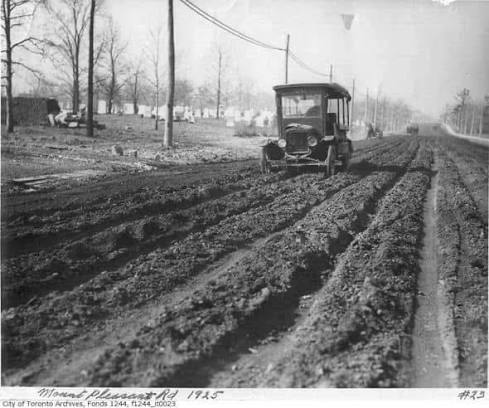 What is the history of the unpaved roads in the 1920s?
