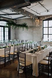 This Mid Century Storys Building Wedding In Downtown Toronto Has A Great Use Of Greenery Junebug Weddings Downtown Wedding Venues Downtown Wedding Rustic Country Wedding
