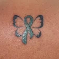 A pair of wings and a purple ribbon design becomes common image if you are not the one who has a sense of concern for cancer. Pin By Chrissy Mccabe On My Style Awareness Ribbons Tattoo Cancer Ribbon Tattoos Cancer Tattoos