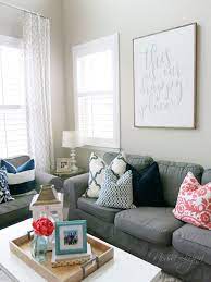 A Fresh Living Room With Pops Of Colors Navy Aqua Gray And Coral Aqua Living Room Aqua Living Room Decor Coral Living Rooms