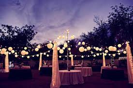 Bring some charm to an outdoor wedding by lighting up the sky with the perfect arrangement of festoon lights. Backyard Lights Wedding Backyard Reception Backyard Wedding Decorations Diy Backyard Wedding