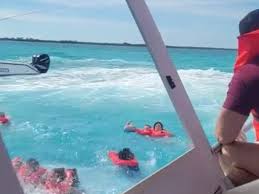 Terrifying moment boat capsizes in The Bahamas, leaving one American dead