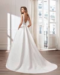 Classic A Line Brocade Wedding Dress Bateau Neckline And Jewelled Back Available In Natural 2019 Coll Wedding Gown Guide Mikado Wedding Dress Bridal Outfits