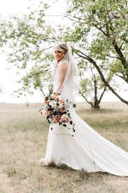 Award winning, modern & creative wedding photography based in hampshire & london. Muted Cotton Candy Pastel Wedding At Pineridge Hollow Winnipeg Wedding Florist Stone House Creative