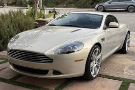 Image result for Titanium Silver 2011 Aston Martin