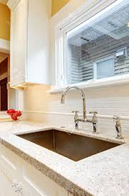large granite kitchen sink with window