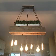 Maybe you would like to learn more about one of these? Custom Reclaimed Barn Wood Beam Chandelier Id Lights Wood Chandelier Rustic Wooden Lamps Design Rustic Kitchen Lighting