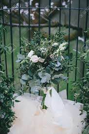 57 vintage wedding ideas for a timeless look that'll forever be in style bring the roaring '20s, glamorous '50s, and hippie '60s back to life. Wedding Bouquet Of Simple White Flowers And Green Leaves In Vintage Style The Effect Of Film Photography Stock Photo Picture And Royalty Free Image Image 63985304