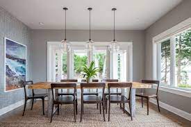 It showcases an open, geometric lantern shape, finished in a neutral black hue for a transitional look that blends in with a variety of color schemes. 59 Dining Room Lighting Ideas Dining Room Lighting Niche Modern Dining Room Design
