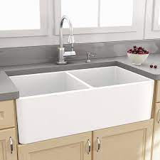Generally, farmhouse sinks installation process depends on the underlying cabinetry. Update The Heart Of Your Home In Sleek Style With This Sink Perfect For Rinsing Dinner D Kitchen Sink Remodel Farmhouse Sink Kitchen Double Basin Kitchen Sink