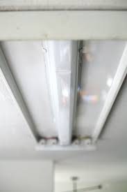 Fluorescent light fixtures tend to be rather heavy; How To Replace A Fluorescent Light With An Led Flush Mount Kitchen Update Tutori Light Fixtures Flush Mount Flourescent Light Fixtures Kitchen Ceiling Lights