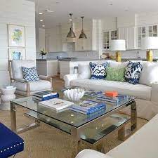 With two rectangular surfaces and sleek legs, this furnishing makes a compelling modern statement. Worlds Away Winston Coffee Table Design Ideas