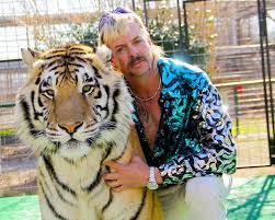 The former zookeeper was sentenced in january 2020 to 22 years in federal prison after being convicted of trying to hire two different men to kill animal rights activist carole baskin and violating wildlife laws. Tiger King Joe Exotic Went To Jail For More Than One Crime